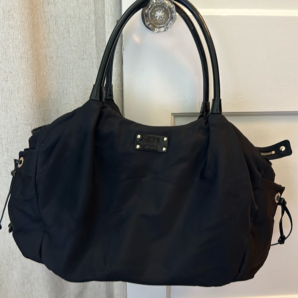 Kate spade baby bag with matching diaper pad